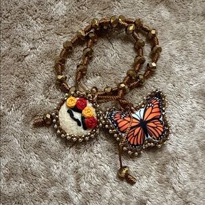 Beaded Bracelet with Butterfly and Frida Charm